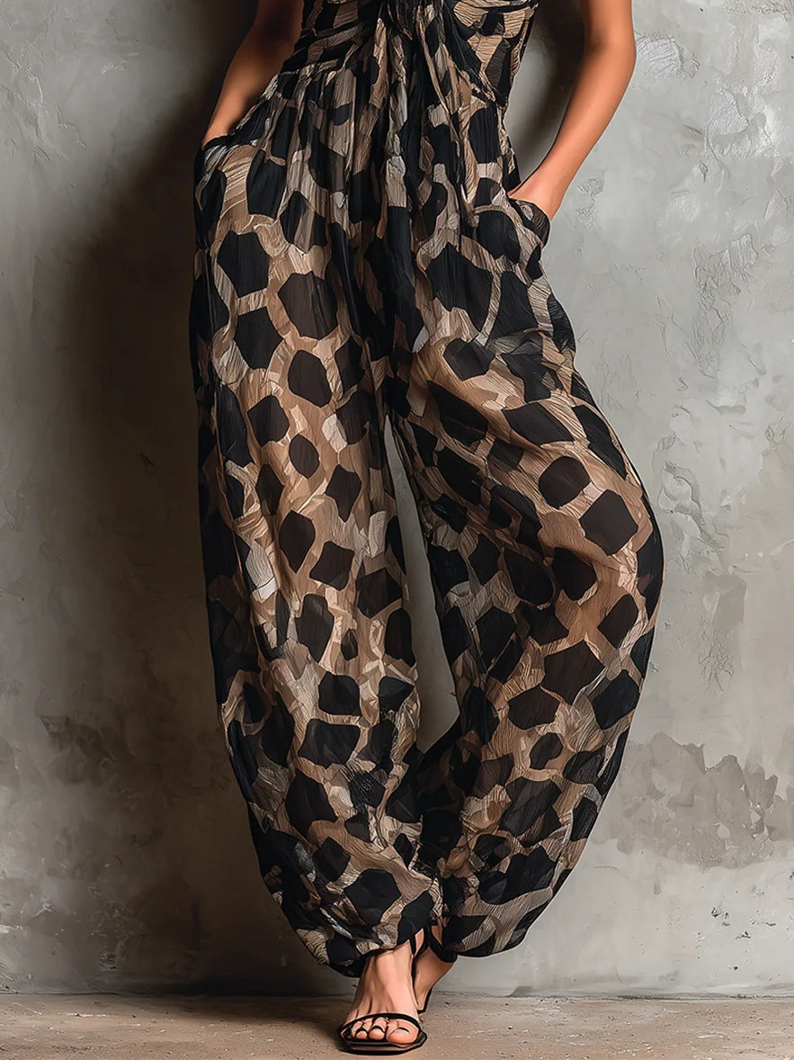 Roberta · Wide Black Jumpsuit with Animal Print, Halter Neck and Trousers