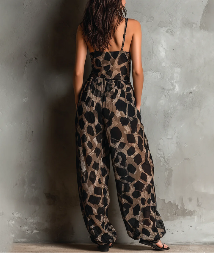Roberta · Wide Black Jumpsuit with Animal Print, Halter Neck and Trousers